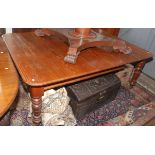 A Victorian pitch pine extending dining table, 138 x 195cm with single leaf inserted.