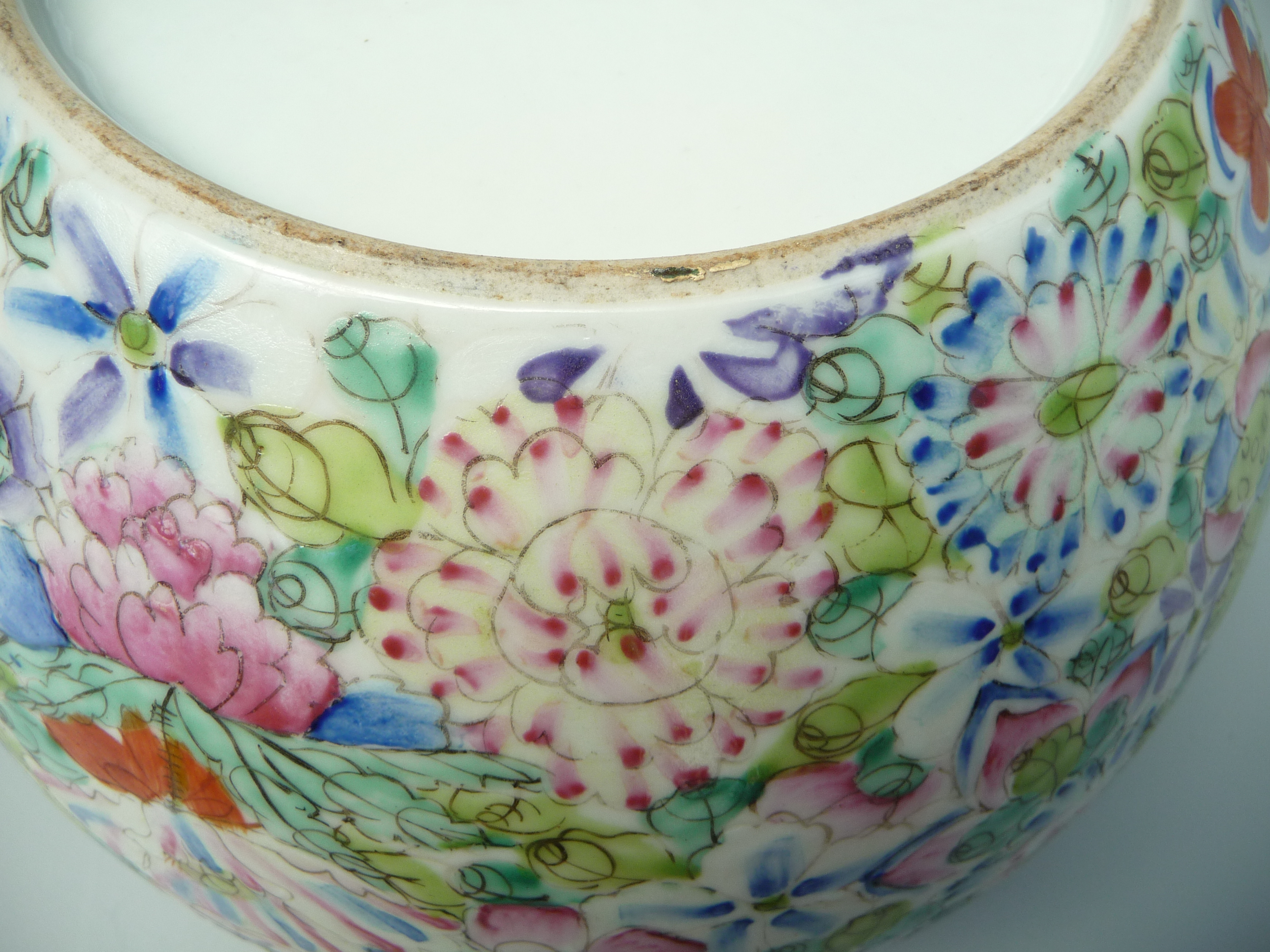 A Chinese porcelain millefiori bowl, densely painted with flowers on a white ground, - Image 7 of 10