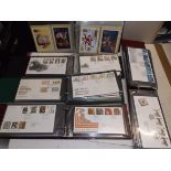 A collection of first day covers in five albums.