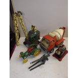 A Lumar tin plate crane, a tin and plastic Tonka cement wagon and three other items.