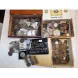 Miscellaneous World coins in three boxes.