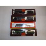 Four boxed locomotives:- 2-10-0 class 9F, "King George V", 2-8-0 class B.F.