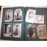 An Edwardian album containing approximately ninety six post cards British and foreign including:-