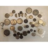 Crowns, 1891, one other, a 1922 $1, a silver Roman coin, four bisects etc.