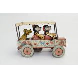 A rare, British made, pre war, Walt Disney Mickey Mouse clockwork car by Wells.