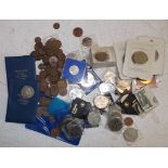 Modern crowns, British currency, a damaged WWI medal etc.