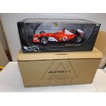 "Hot Wheels" F2003-GA Michael Schumacher's F1 Ferrari sold together with an auto art display case.