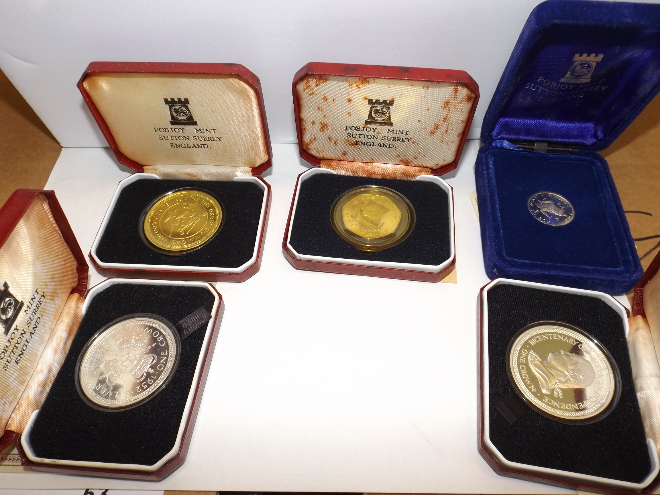 Isle of Man :- Five silver coins, three crown size, a pound and a 50 pence.