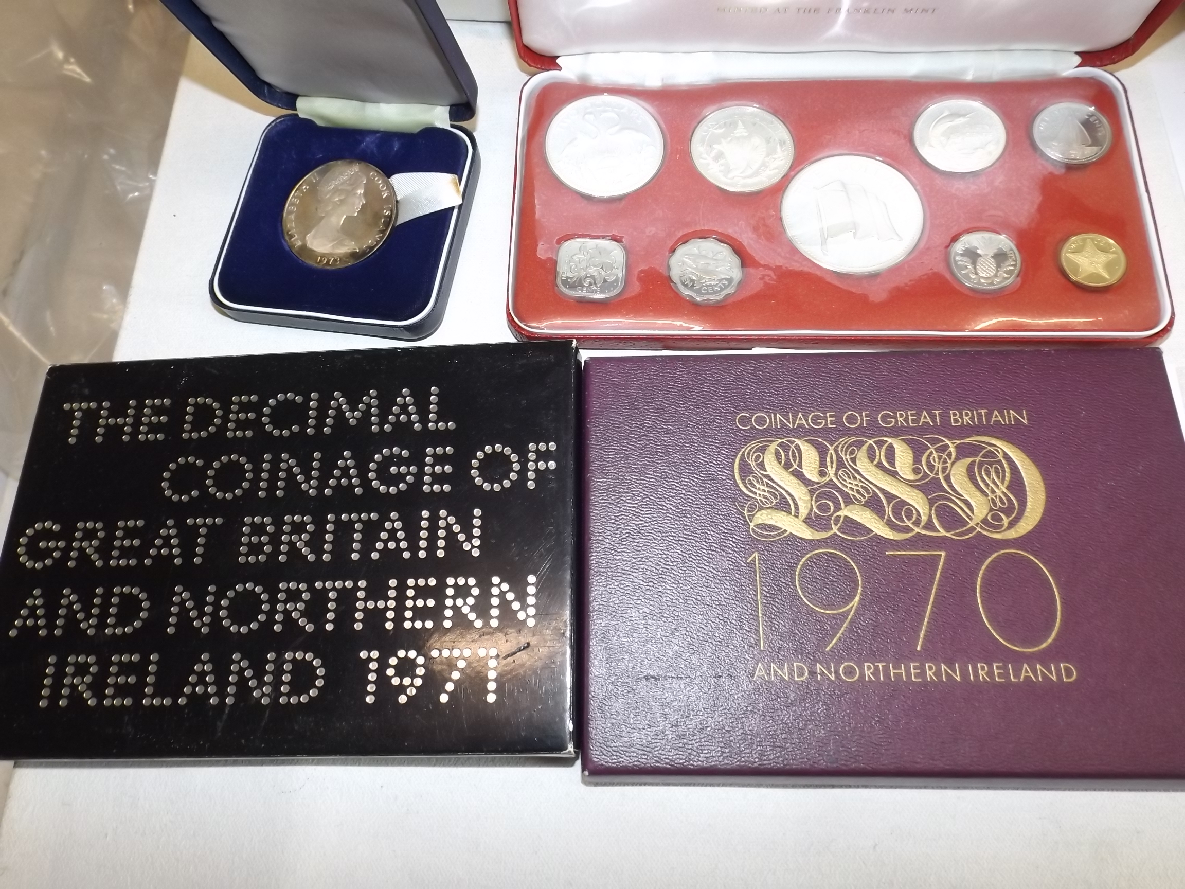 Bahamas:- 1974 proof set 1970 & 1971 British Year sets and a Cook Islands 1973 $2 cased.