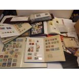 World stamps in albums, stock books including a few covers.