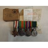 Group of four medals:- WWII medal, defence,