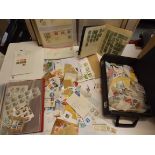 Mainly British stamps on paper in packets including F.D.C.'s and George V duplicated.