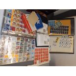 Albums of duplicated British stamps etc.