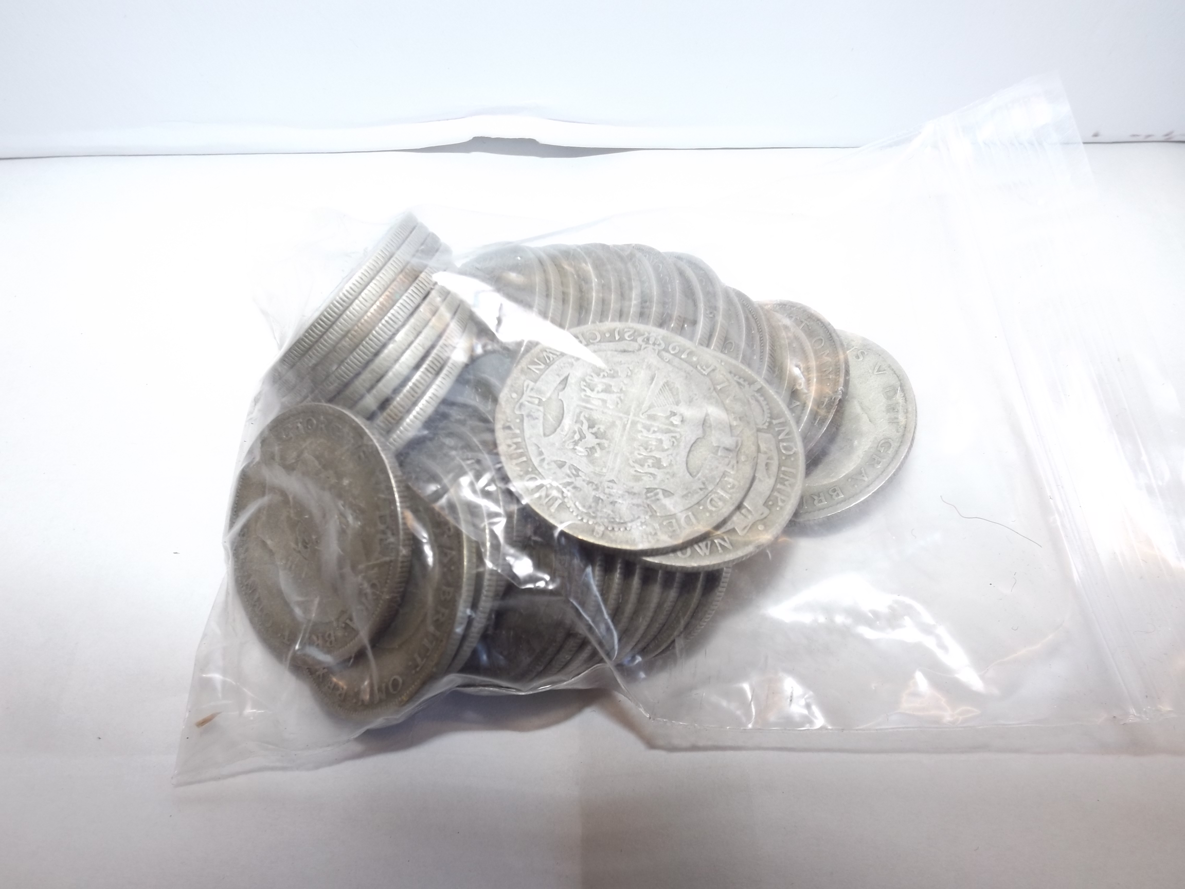 £5 face value British pre 1947 silver coins.