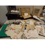 A large collection of first covers, stamps on card, empty albums etc.