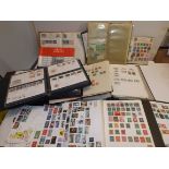 Several albums of world stamps, first day covers etc.