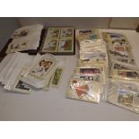 A collection of P.H.Q. cards, most are used.