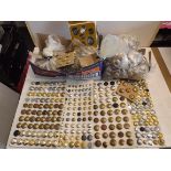 A good and large duplicated collection of military buttons on cards and in bags.