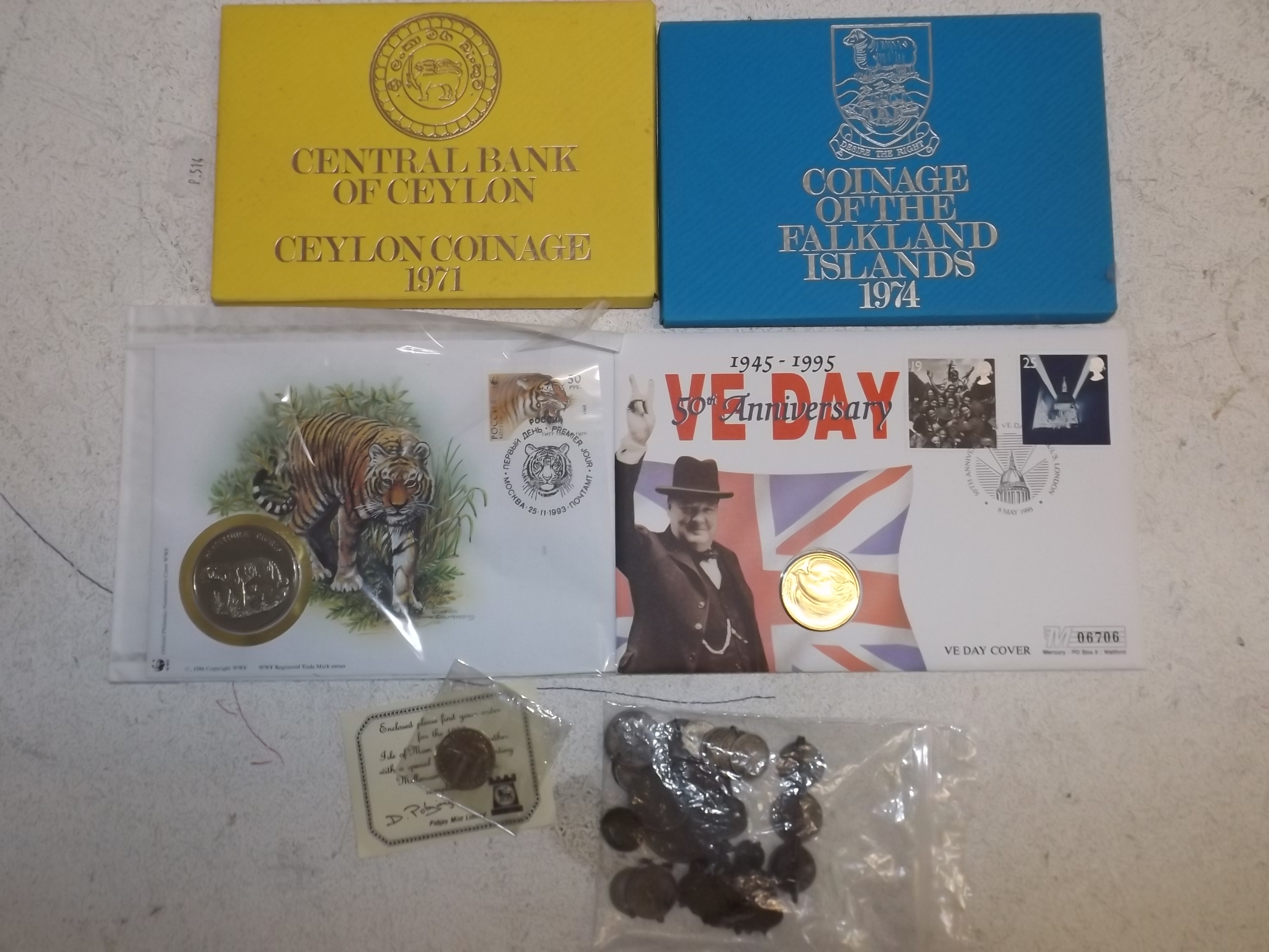 A Falkland Islands coin set, a Ceylon coin set etc.