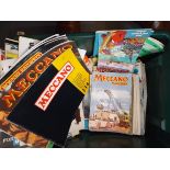 A plastic box of Meccano magazines etc.