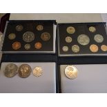 1993 and 1996 proof coin sets, four £5 coins and a 50p.