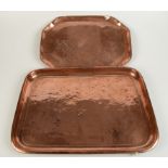 Two copper trays, early 20th century, widths 51cm and 43.