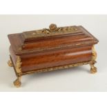 A carved parcel gilt casket,