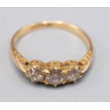 An 18ct gold Edwardian ring set three diamonds, Chester hallmark.
