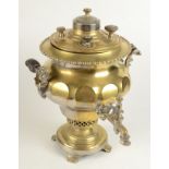 A Russian brass samovar, with maker's mark to cover and turned wood handles, height 40cm.