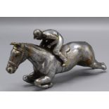 A chrome plated horse and jockey car mascot, length 14.5cm.