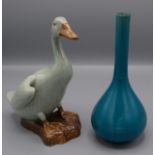 A Chinese turquoise glazed vase with a slender neck and bulbous body, height 23.
