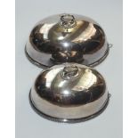 A pair of graduated oval meat covers, by Mappin & Webb, each with a gadrooned edge,