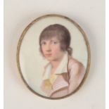 A rare late 18th century Battersea or south Staffordshire enamel miniature portrait of a young man