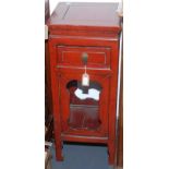 A Chinese red lacquered side cabinet, the square top above a single frieze drawer, height 86.