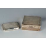 An engine turned silver cigarette box and an engine turned silver cigarette case.
