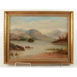 A gilt framed oil on canvas of a lakeland landscape, signed T.H. Burgess, 39 x 55cm.