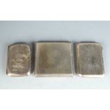 Three engine turned silver cigarette cases. 7.7oz.