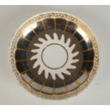 A porcelain dish, circa 1800-1810, possibly Coalport, with gilt and silver lustre decoration,