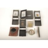 A Dennison First World War field compass dated 1916 together with various Zippo and other lighters.