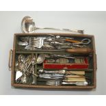 Miscellaneous silver plated flatware, including a soup ladle, length 32.5cm, in wicker cutlery tray.