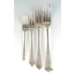 Two silver bull-nose forks by R Comyns, a Georgian table fork and one other fork. 7.2oz.