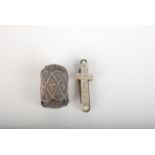 An early 19th century French silver mounted small pin cushion and a miniature 19th century pen