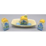 A Clarice Cliff crocus pattern 'Bizarre' cruet set, comprising salt,