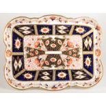 A J.B & Son porcelain tray of lobed form and decorated in the imari pattern, 34 x 44.2cm.
