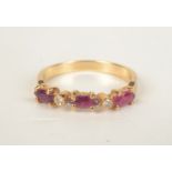 A 14ct gold diamond and navette ruby ring.