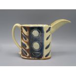 A Nigel Lambert Studio Pottery jug, the cream ground with painted stylised motifs, height 14.