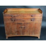 A Heals oak sideboard, circular makers plaque in the drawer inscribed 'Heal & Son, London, W',