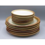 Six Winchcombe Pottery dinner plates, diameter 27.3cm and six matching side plates, 17cm diameter.