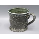 A Walter Keeler Studio Pottery saltglaze mug, height 9cm, diameter 9.6cm.
