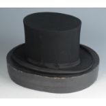 A silk pop up top hat, bearing a label 'Meakers, Piccadilly.W.', inside measurement 19.5 x 15.7cm.